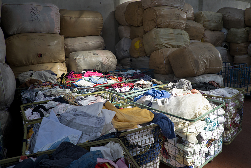photo of recycled clothing sorted and bundled